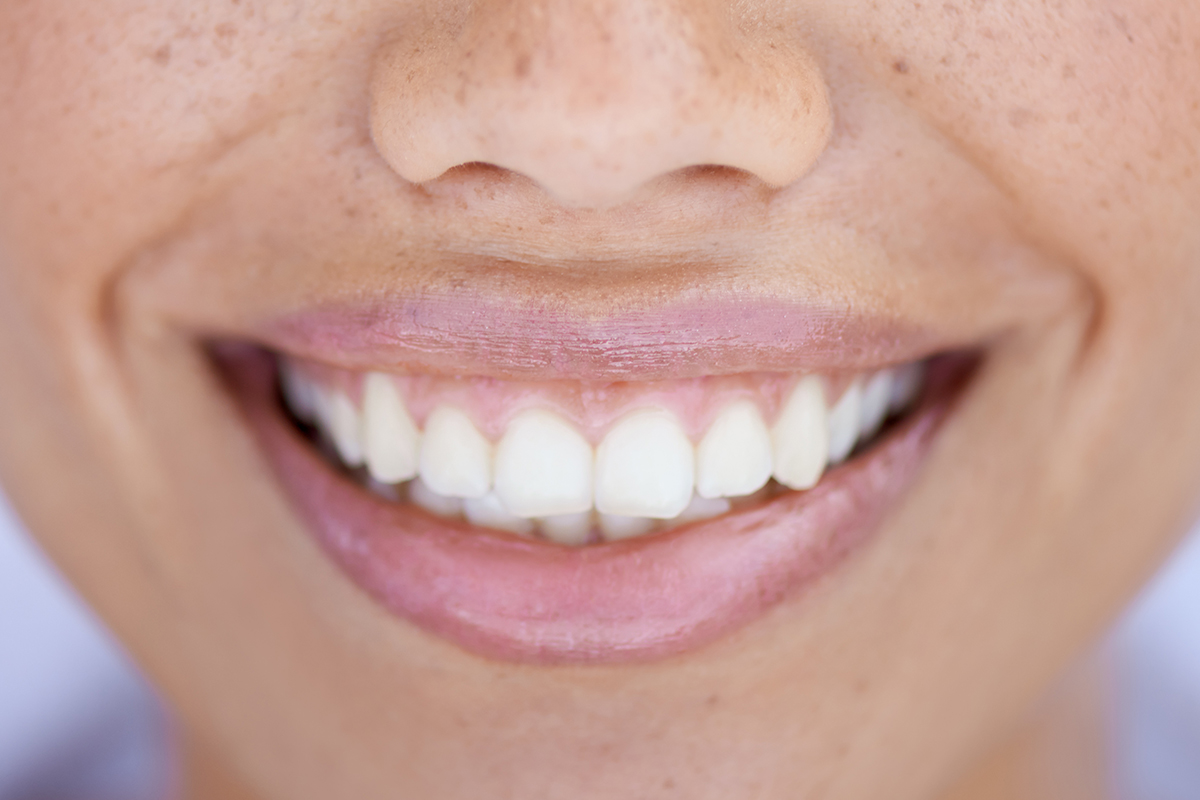 Headshot Happy Aged Female Laughing Posing On Grey Studio Background